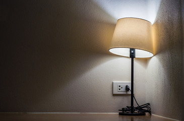 One lamp in dark room