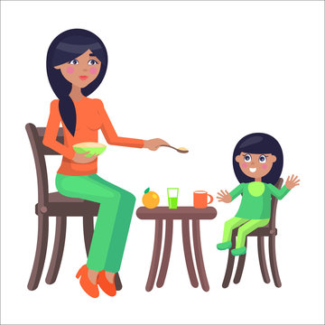 Mother Feeds her Little Daughter, Sitting at Table