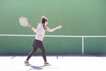 Foto op Canvas テニスの練習をする女性 © hakase420