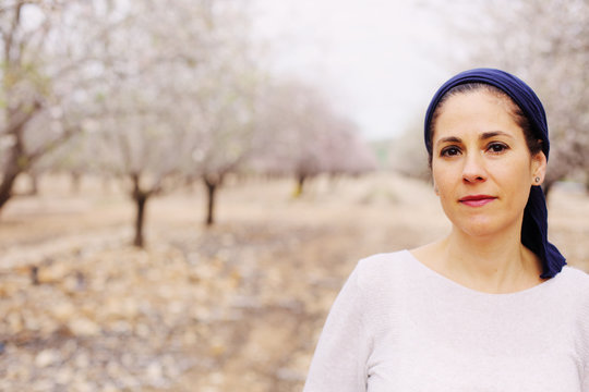 Outdoor portrait of 40 years old woman