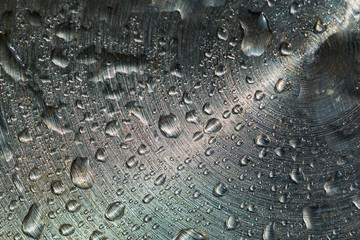 Metal texture steel grey with water droplets macro