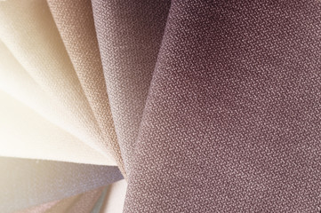Bright collection of gunny textile samples. Multicolor Fabric texture background.