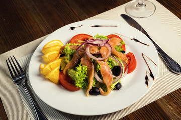 Warm salad with seafood.Serving dishes in a restaurant, European cuisine, European restaurant, pub