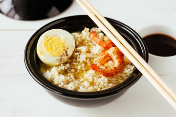 Rice with shrimps and hard-boiled egg