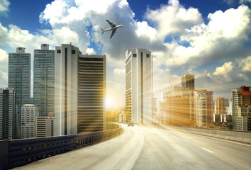 city road through modern buildings or modern office building background