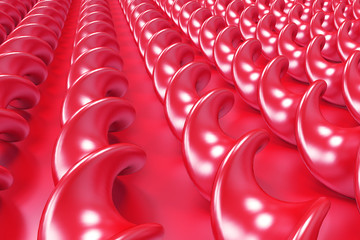 Red plastic spiral sticks on red background