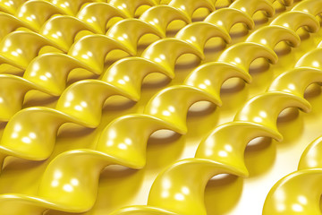 Obraz premium Yellow plastic spiral sticks on yellow background