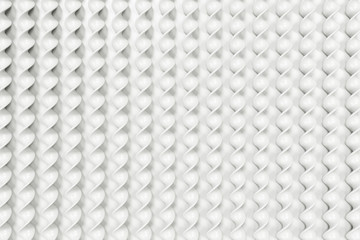 White plastic spiral sticks on white background