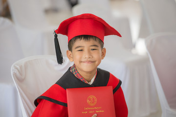 Asian boy Red graduation gown