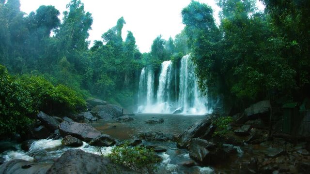 Rain and a tropical waterfall in Phnom Kulen National Park