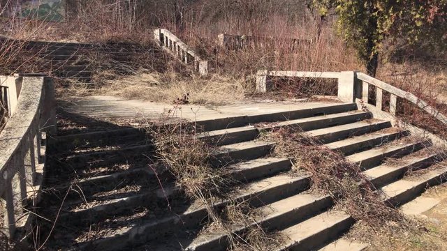 Ancient scary stairways in the forest 4K 2160p 30fps UltraHD footage - Abandoned building stairs nature POV 3840X2160 UHD video 