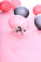Easter eggs on pink background