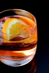 Glass of beverage with ice