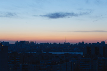 Fototapeta premium Silhouettes of houses and architecture of a modern urban Voronezh, cityscape aga