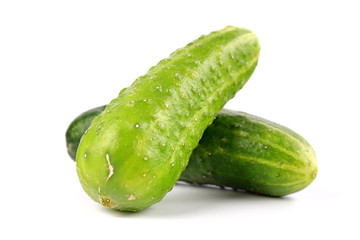 Two cucumbers on white background