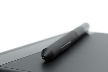 Graphic tablet with pen for illustrators and designers, isolated on white background