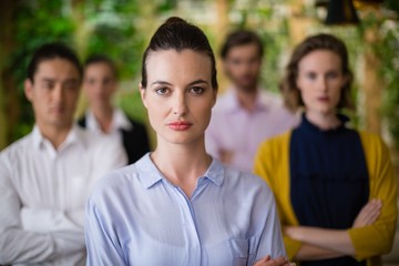 Business executives standing in office