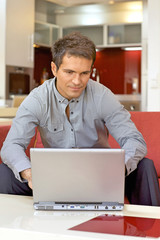 Young man using laptop