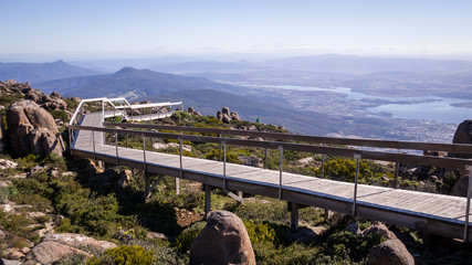Walkway at Mt Wellington lookout for tourists to overlook Hobart Derwent River and the city day...