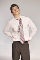 Young caucasian businessman with lipstick kiss mark on his cheek