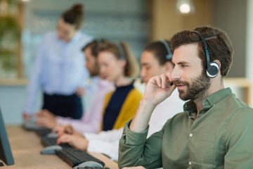 Customer service executives working in call center