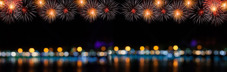 Night Scene Panorama. Abstract background Big beautiful fireworks show lighting celebration.copy space (Light blur and bokeh)