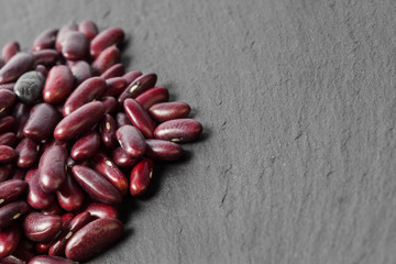 Fototapeta na wymiar red beans on the black table