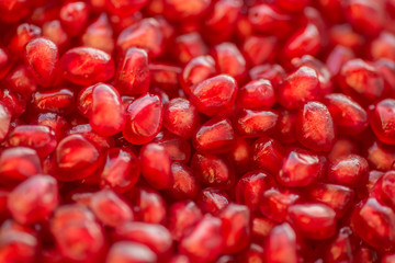 Fresh ripe pomegranate. Macro with shallow depth of field.