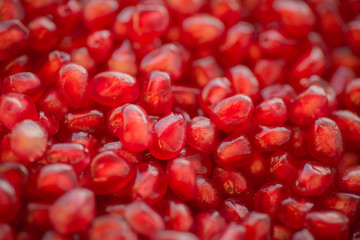 Fresh ripe pomegranate. Macro with shallow depth of field.