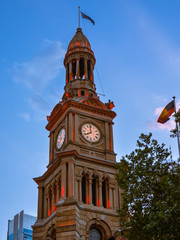 Fototapeta na wymiar Clock Tower of Sydney Town Hall at Dusk - Sydney, Australia