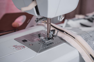 sewing machine and item of clothing