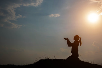 silhouette woman pray to god