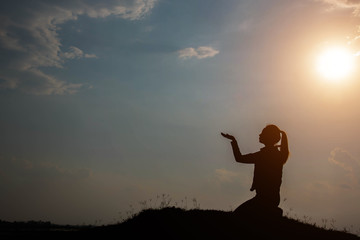 silhouette woman pray to god