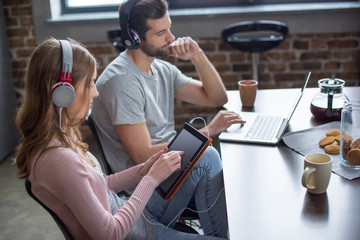 Couple using devices