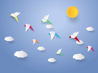 Flock of birds flying in the sky , paper art style