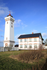 Fototapeta na wymiar The historic Helnaes Lighthouse on Fyn Island, Denmark, built 1900