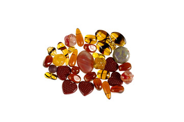 Pressed multicolored glass beads on white background - isolated