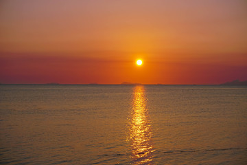 Seascape with Dramatic Orange Sunset