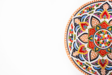 Oriental ceramic plate with beautiful colorful ornament