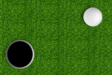 golf ball and hole on the green grass of the golf course