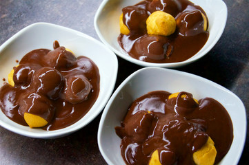 Profiteroles in chocolate mousse