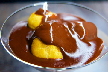 Profiteroles in chocolate mousse