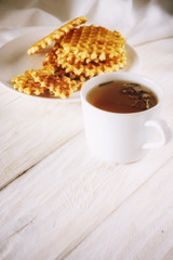 Tea with lemon and wafer