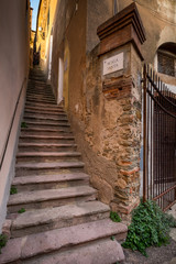 Fototapeta na wymiar Castagneto Carducci, Leghorn, Italy - Scala Santa, typical medieval streets in the historic center