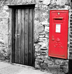 Post box on old wall