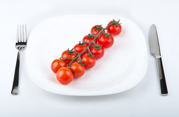 Cherry tomatoes on white dish