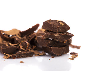  Pieces of black chocolate against white background