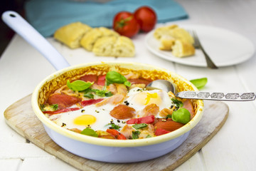 Breakfast pan with vegetables and eggs