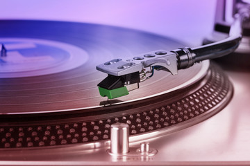  Turntable player with musical vinyl record. Useful for DJ, nightclub and retro theme.