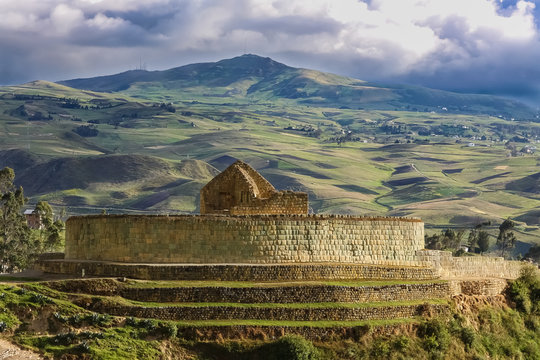 Scenic Inca ruins of Ingapirca and surrounding green andean landscape with dramatic sky, Ecuador